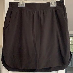 Athleta Skirt tulip hem with bike shorts pockets